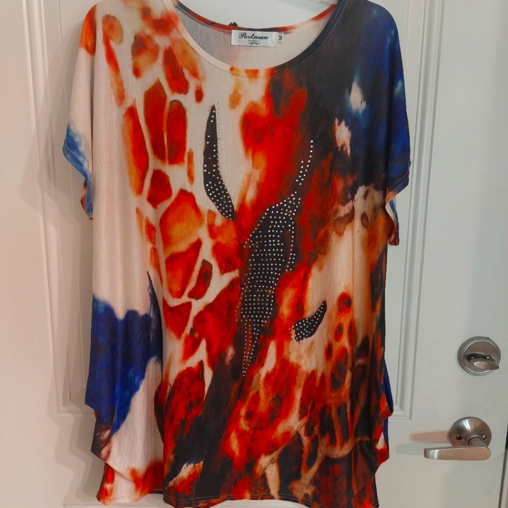 Colorful, artsy blouse.